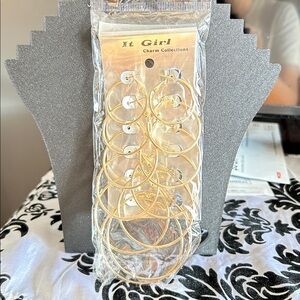 IT GIRL FASHION hoops earrings new in original packaging. (6pairs)